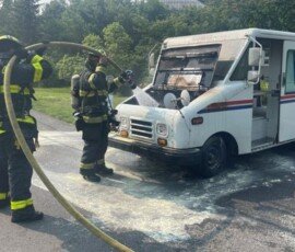 United States Postal Service vehicle caught fire on State Road in Great Barrington, Mass